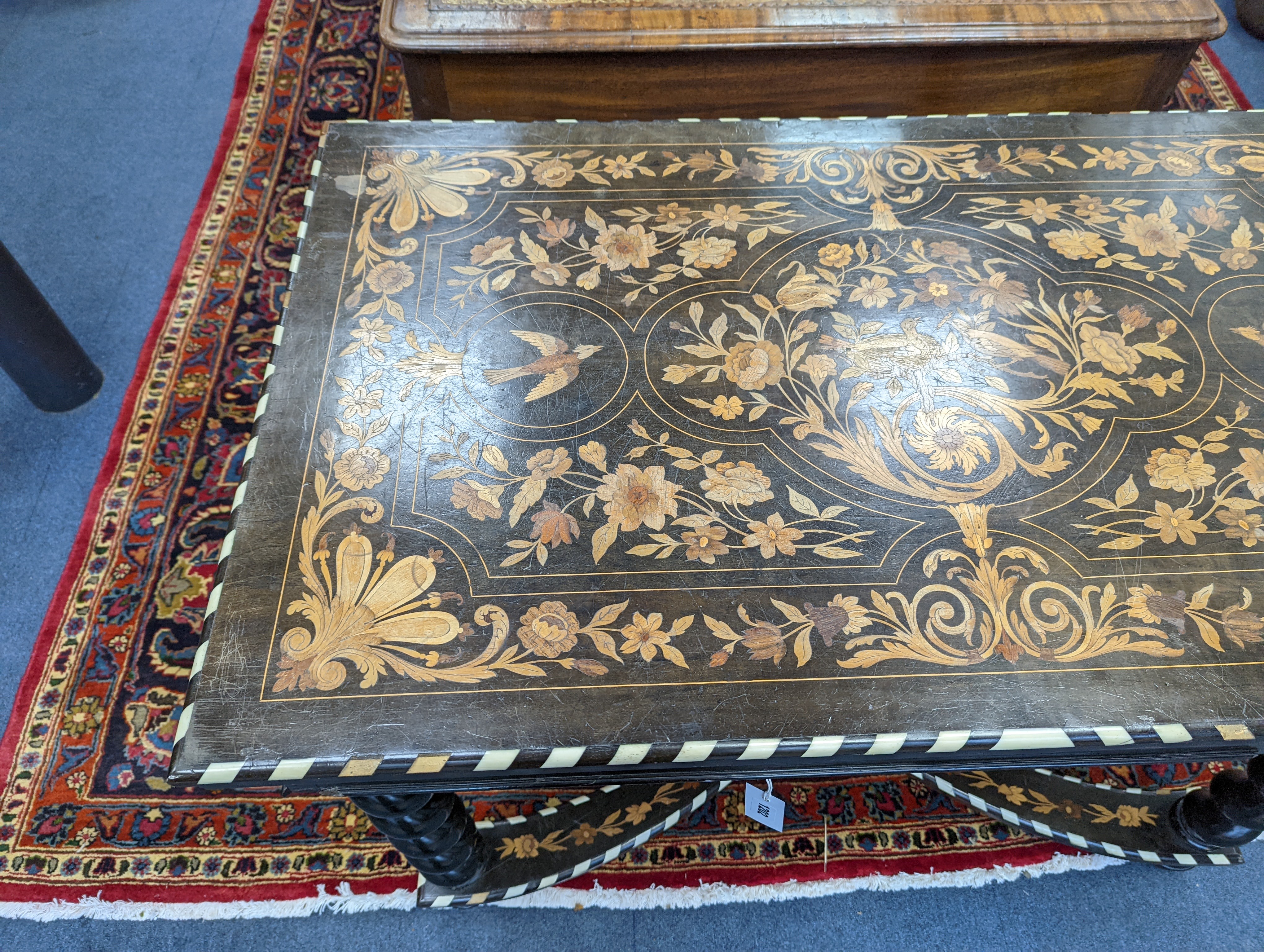 A William and Mary style rectangular marquetry and bone inlaid walnut side table, fitted drawer on ebonised spiral turned under frame with shaped X stretcher width 110cm, depth 67cm, height 78cm